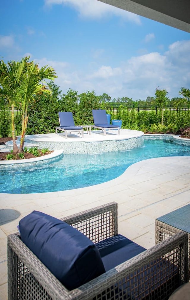 2424 Park Ridge St, Apopka, FL 32712 - view of swimming pool featuring a patio