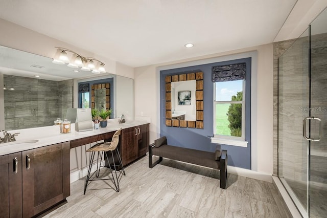 2424 Park Ridge St, Apopka, FL 32712 - bathroom featuring double vanity, a stall shower, recessed lighting, and wood finished floors