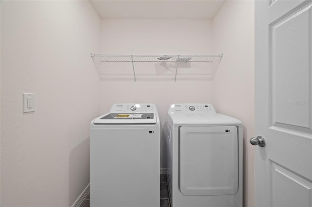 washroom featuring laundry area and independent washer and dryer