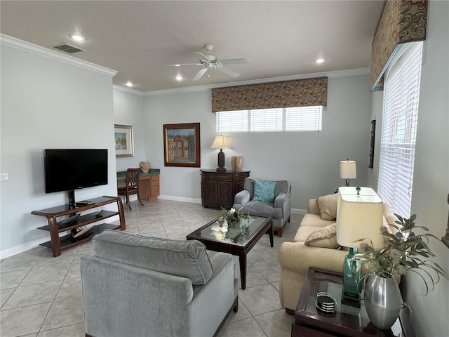 living area featuring ornamental molding, visible vents, baseboards, and light tile patterned floors