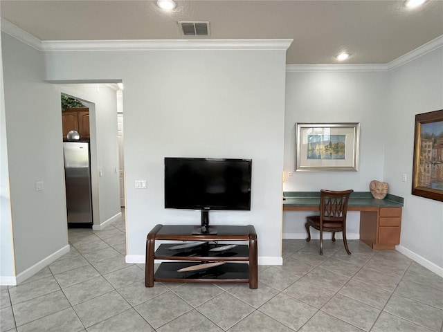 tiled living room with crown molding and built in desk