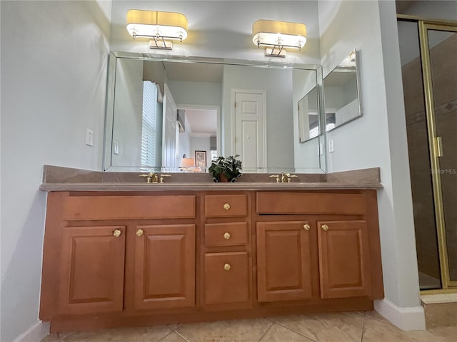 bathroom with tile patterned flooring, walk in shower, and vanity