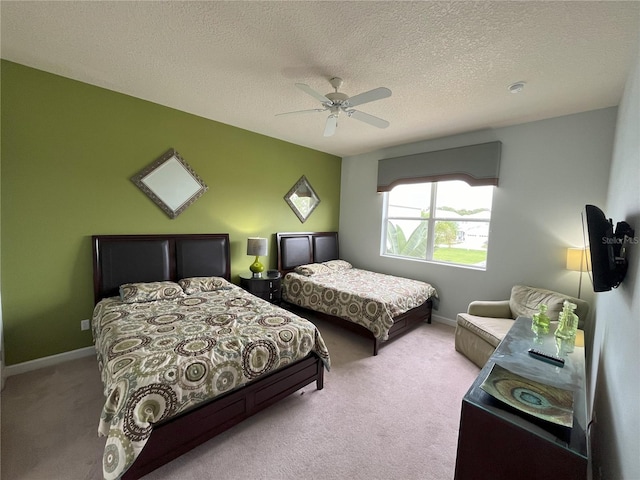7762 Linkside Loop, Reunion, FL 34747 - bedroom featuring carpet flooring, a textured ceiling, a ceiling fan, and baseboards