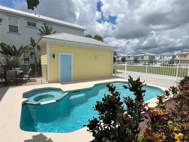 7762 Linkside Loop, Reunion, FL 34747 - view of swimming pool with a patio area, fence, a pool with connected hot tub, and a residential view