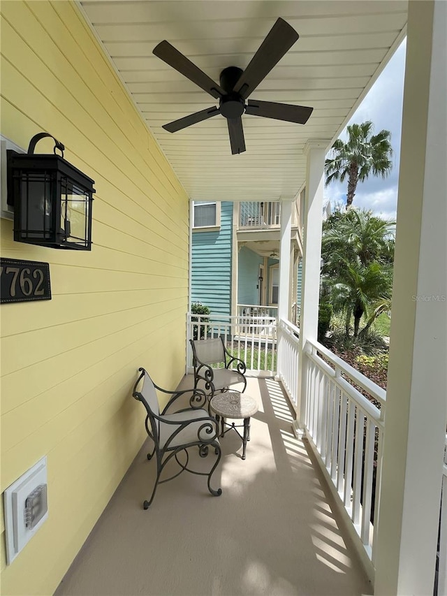 balcony featuring ceiling fan