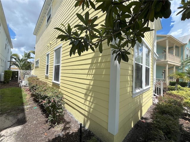 view of home's exterior featuring a balcony