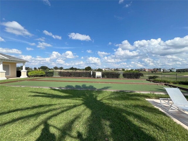 view of community featuring a lawn