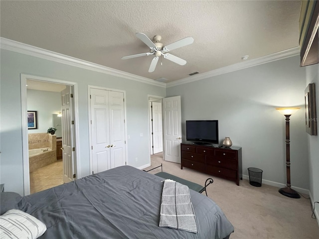 bedroom with ceiling fan, ensuite bath, ornamental molding, light colored carpet, and a textured ceiling