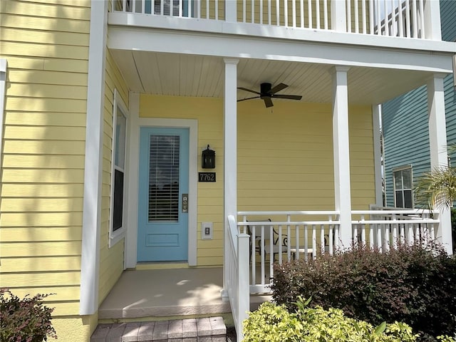 7762 Linkside Loop, Reunion, FL 34747 - property entrance with covered porch and ceiling fan
