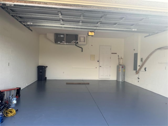 garage with electric water heater, a garage door opener, and electric panel