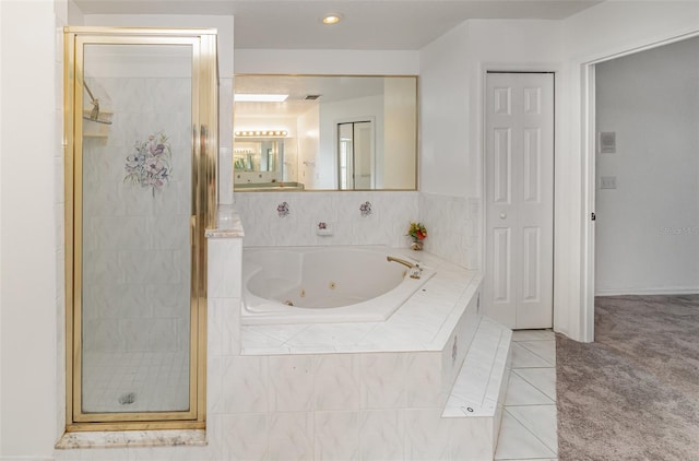 bathroom featuring plus walk in shower and tile patterned flooring