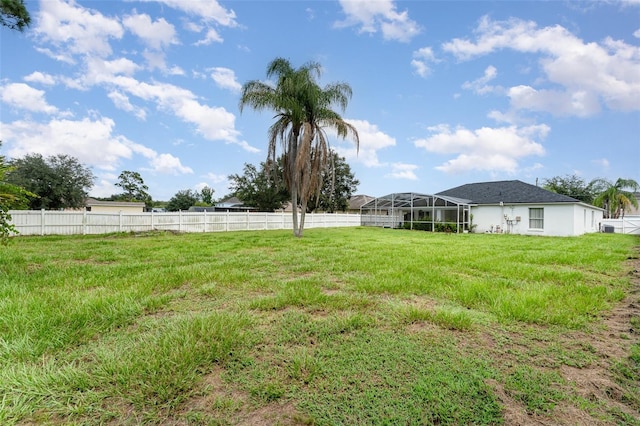 view of yard featuring a lanai