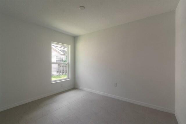 view of tiled spare room