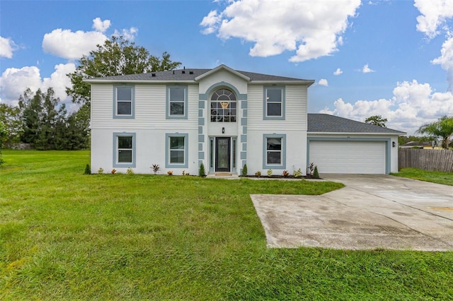 view of front facade featuring a garage and a front lawn