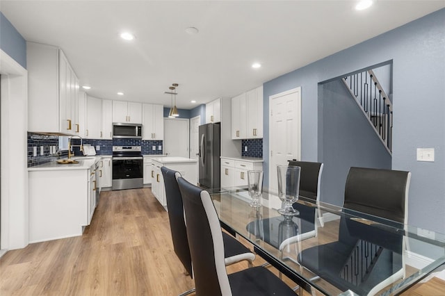 dining area featuring light hardwood / wood-style floors