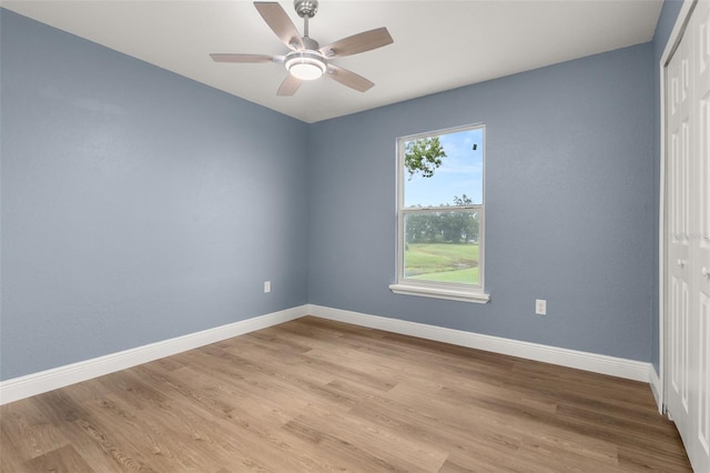 unfurnished room with light hardwood / wood-style flooring and ceiling fan