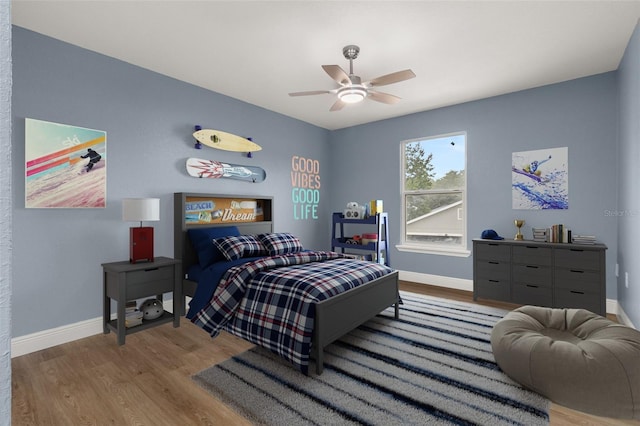 bedroom featuring ceiling fan and light wood-type flooring