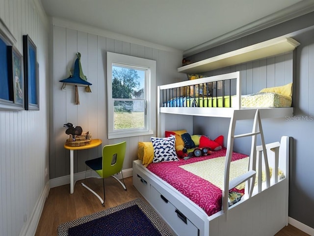 bedroom with wood-type flooring