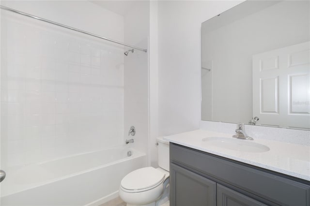 full bathroom with  shower combination, toilet, and vanity