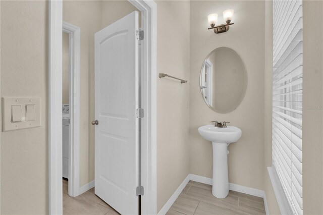 bathroom with tile patterned flooring