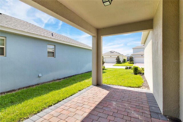 view of patio / terrace with a garage