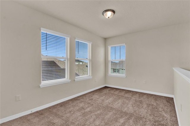 view of carpeted spare room