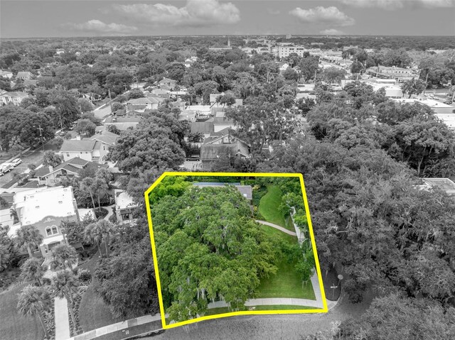 birds eye view of property with a residential view