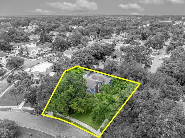 birds eye view of property with a residential view