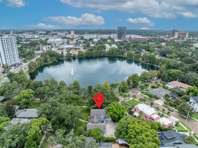 drone / aerial view with a view of city and a water view