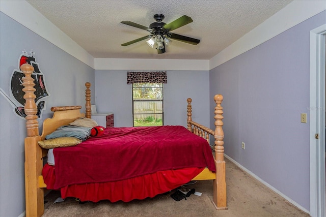 bedroom with carpet floors, a textured ceiling, and ceiling fan