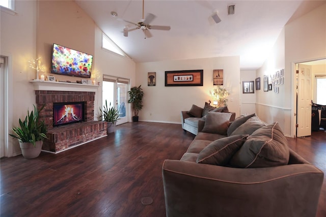 living room with hardwood / wood-style flooring, high vaulted ceiling, a fireplace, and ceiling fan