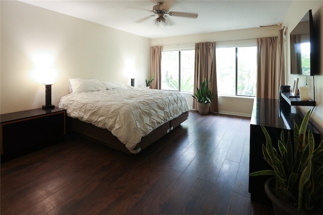 bedroom featuring ceiling fan and wood-type flooring