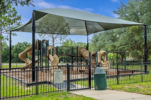 community play area featuring fence