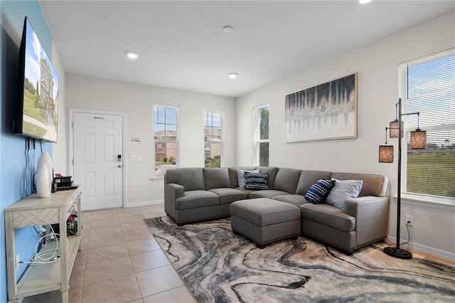 living room with light tile patterned flooring