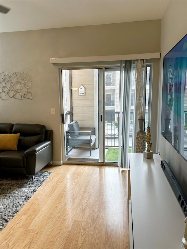 doorway to outside featuring hardwood / wood-style floors