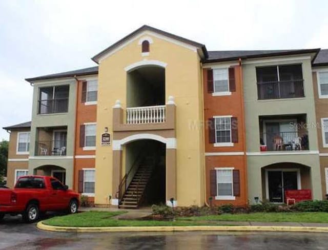 view of building exterior featuring stairs