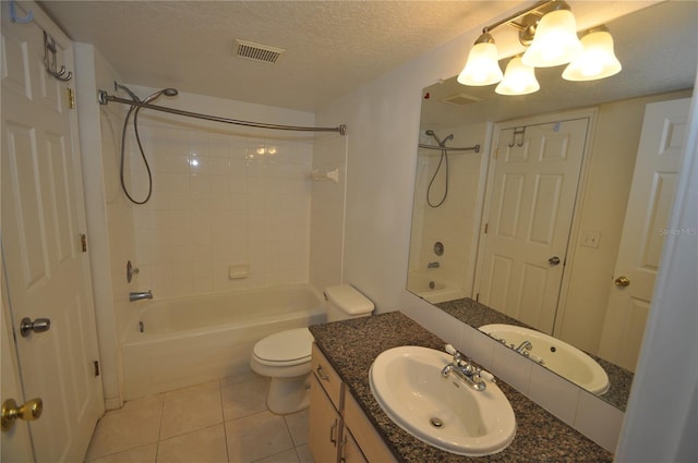 bathroom featuring shower / bathing tub combination, a textured ceiling, visible vents, and tile patterned flooring