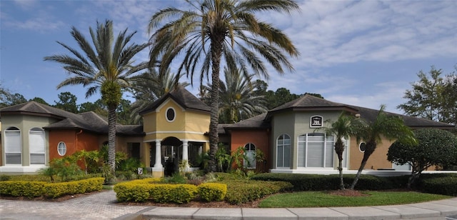 view of front of house featuring stucco siding