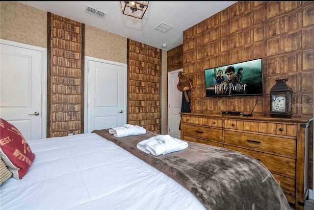 bedroom featuring a textured ceiling