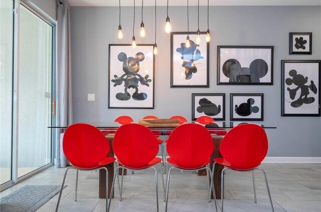 tiled dining room with a wealth of natural light