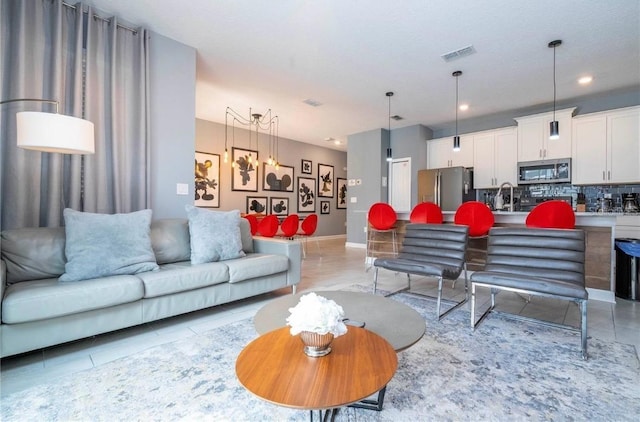 living room featuring light tile patterned flooring