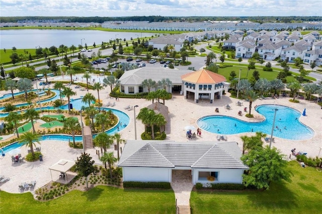 drone / aerial view with a water view