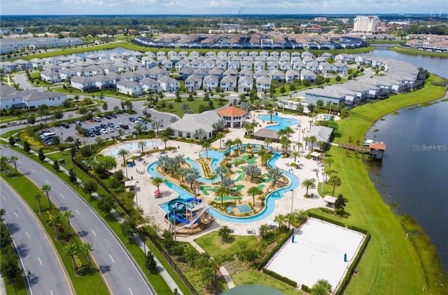 birds eye view of property featuring a water view