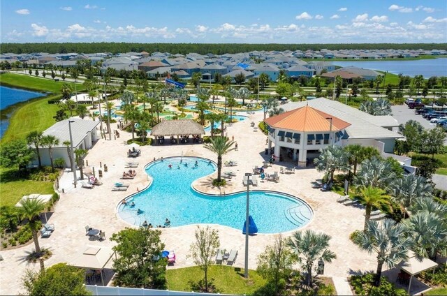 view of pool featuring a patio