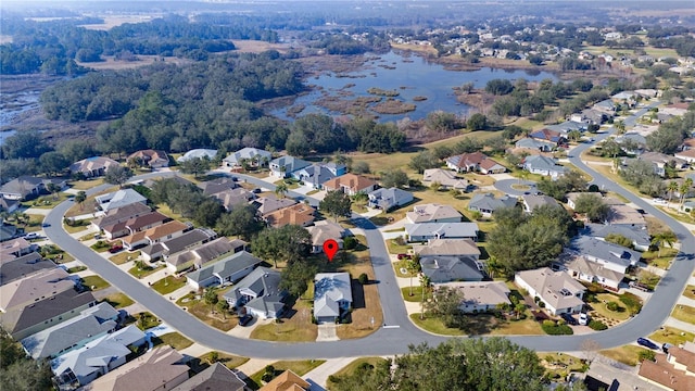 aerial view with a water view and a residential view