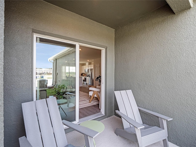 doorway to property featuring a balcony