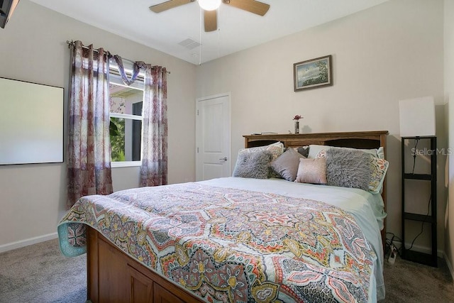 carpeted bedroom with ceiling fan