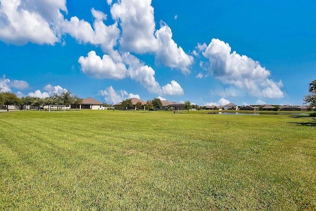 view of yard featuring a water view