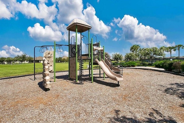 view of jungle gym featuring a yard