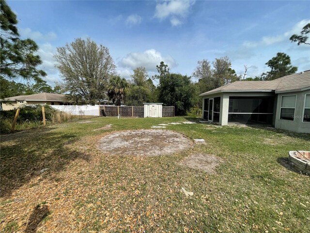 view of yard with a sunroom